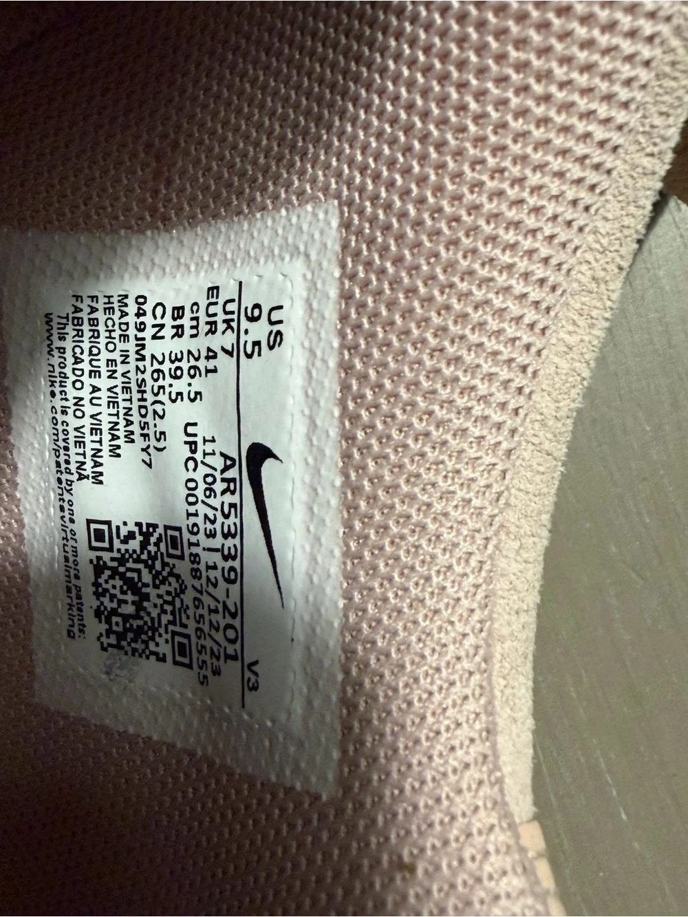 Nike Women’s Light Pink Suede Platform Sneakers